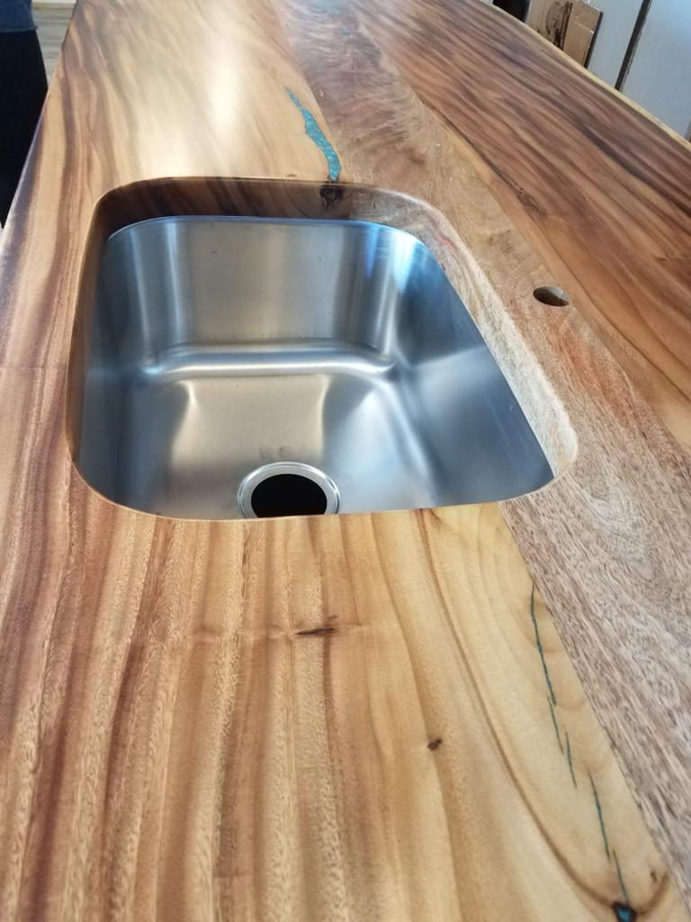 Custom Foundwood slab installation in Hawai'i